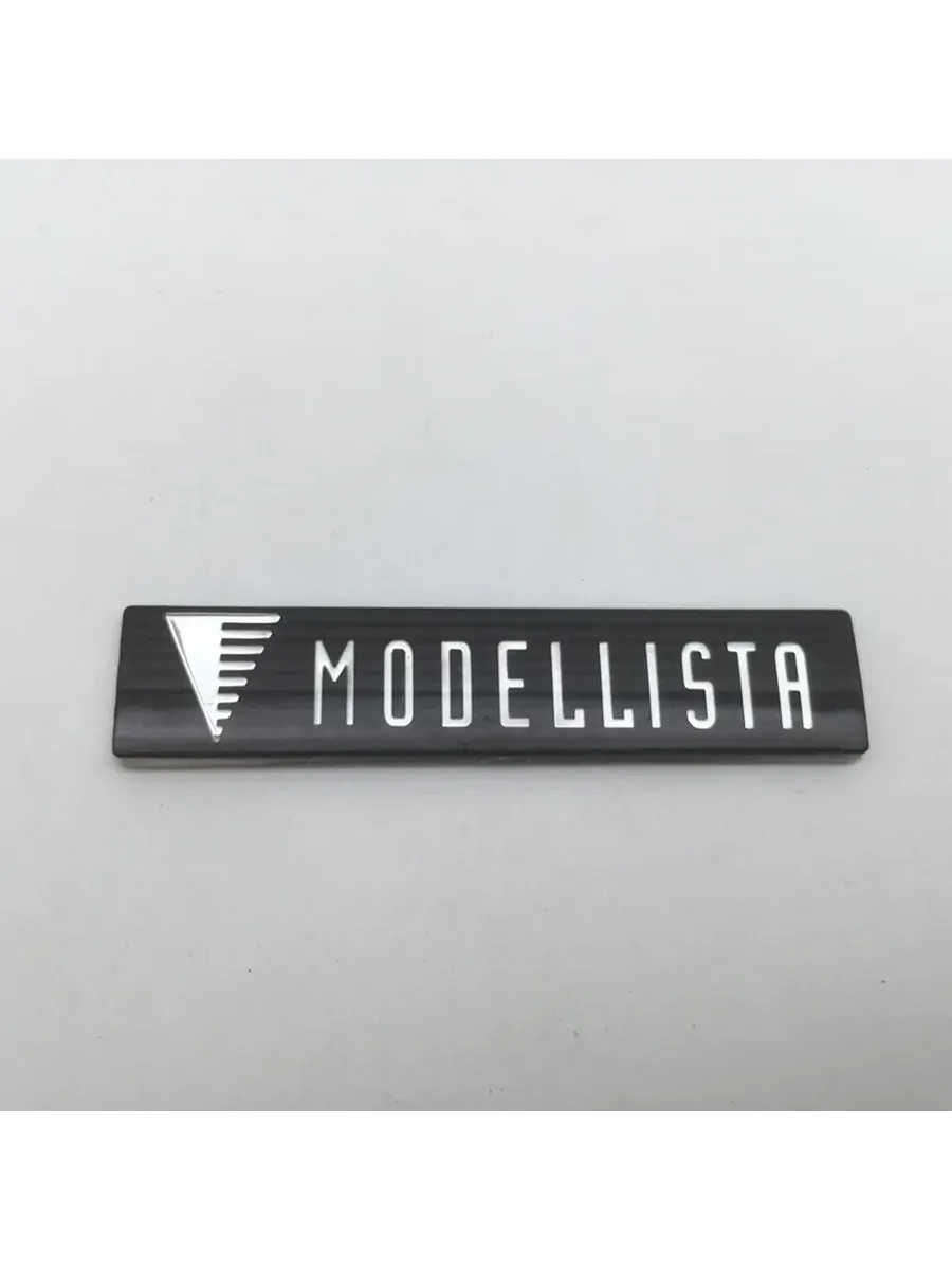 Эмблема MODELLISTA черная серебристая, 1 шт.
